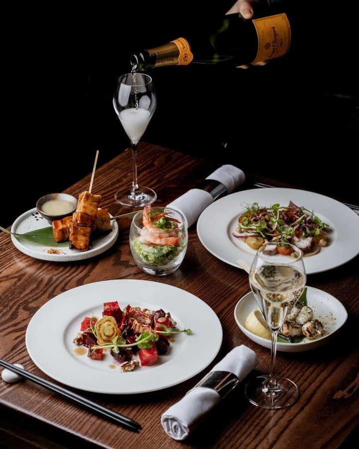 Elegant table setting at TOKii, gourmet dishes for upscale events and corporate functions.