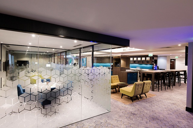Modern meeting space with glass walls in Malmaison Birmingham for collaboration and networking.