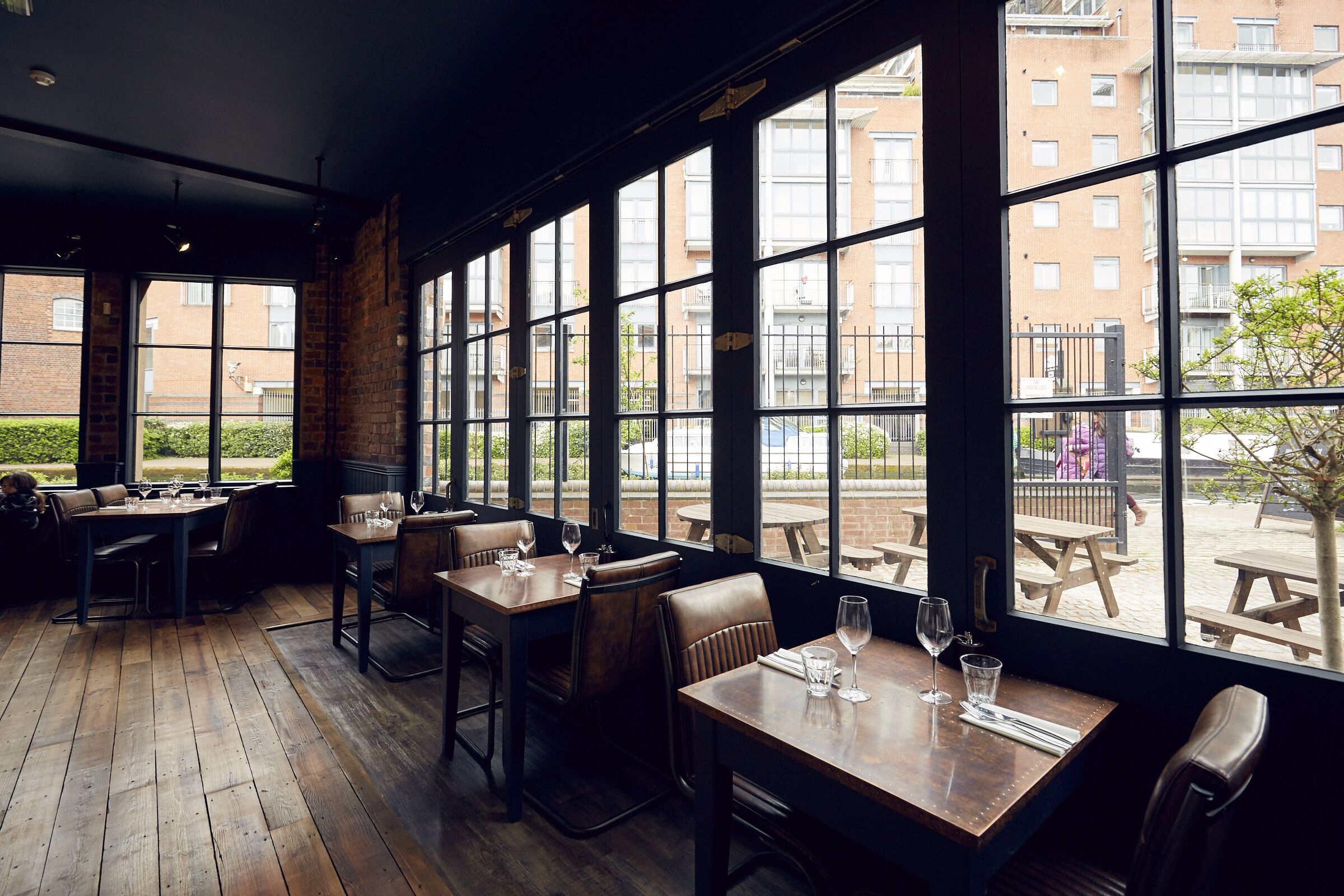 Stylish Birmingham restaurant with large windows, perfect for intimate dining events.