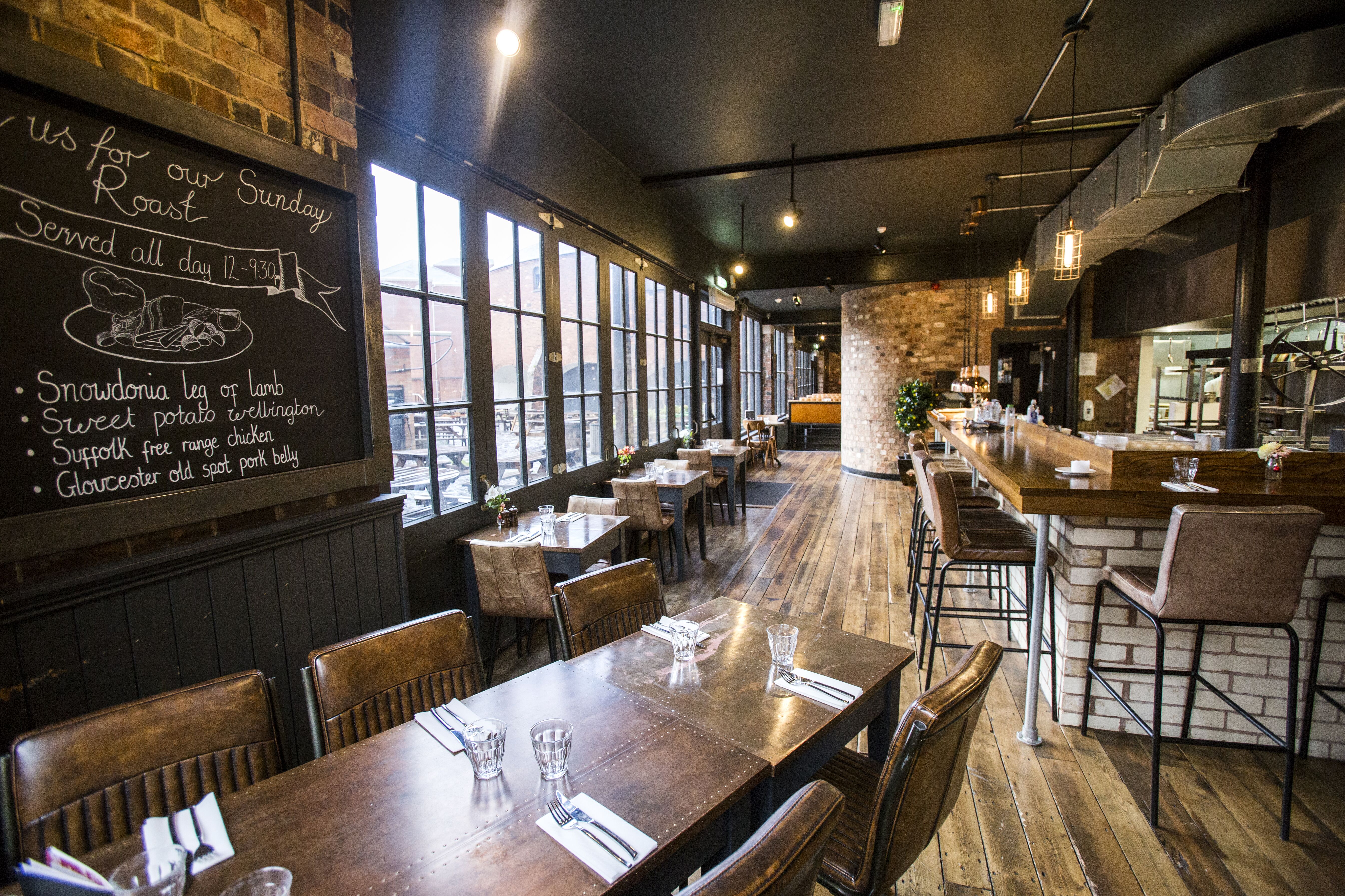 Stylish restaurant in The Distillery Birmingham, perfect for events with warm ambiance.