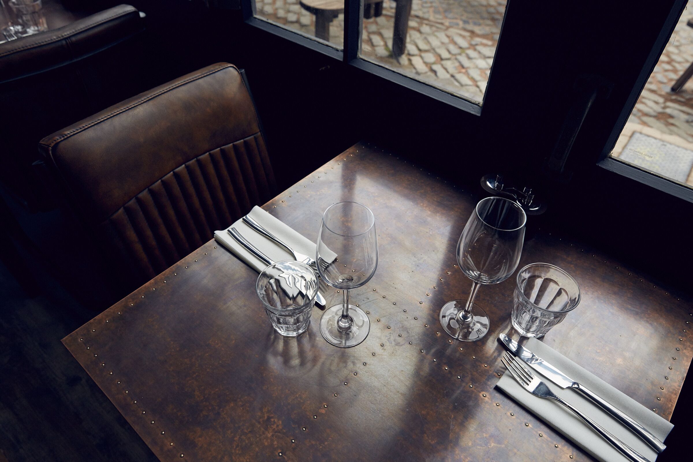 Elegant dining table in The Distillery Birmingham, perfect for corporate dinners and upscale events.
