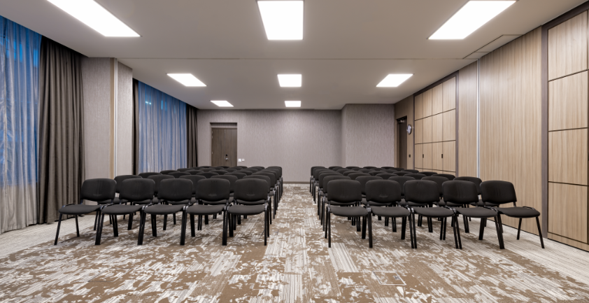 Theater-style breakout room at AC Marriott Manchester for corporate event or business presentation.