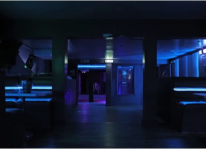 Modern event space in Metro Dalston with ambient blue and purple lighting for parties.