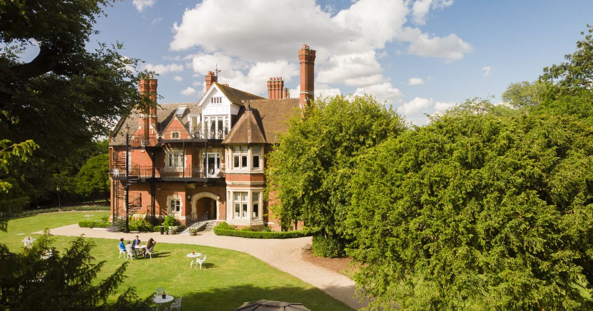 Charming Berwick Lodge mansion, ideal for outdoor corporate events and elegant receptions.