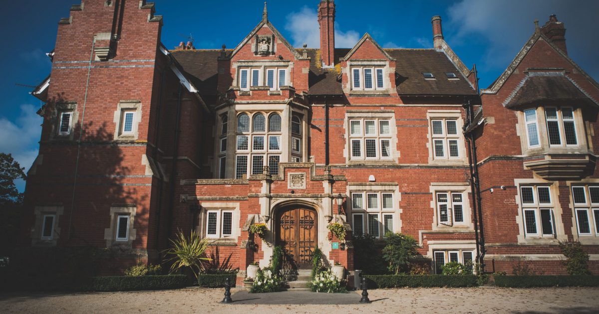 Elegant red-brick mansion at Berwick Lodge, perfect for upscale weddings and corporate events.