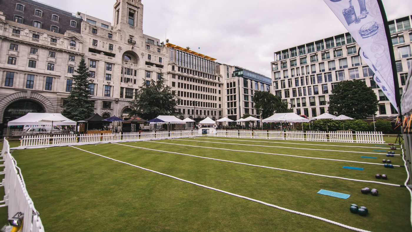 Outdoor event space at Festibowl with manicured lawn, ideal for corporate gatherings.
