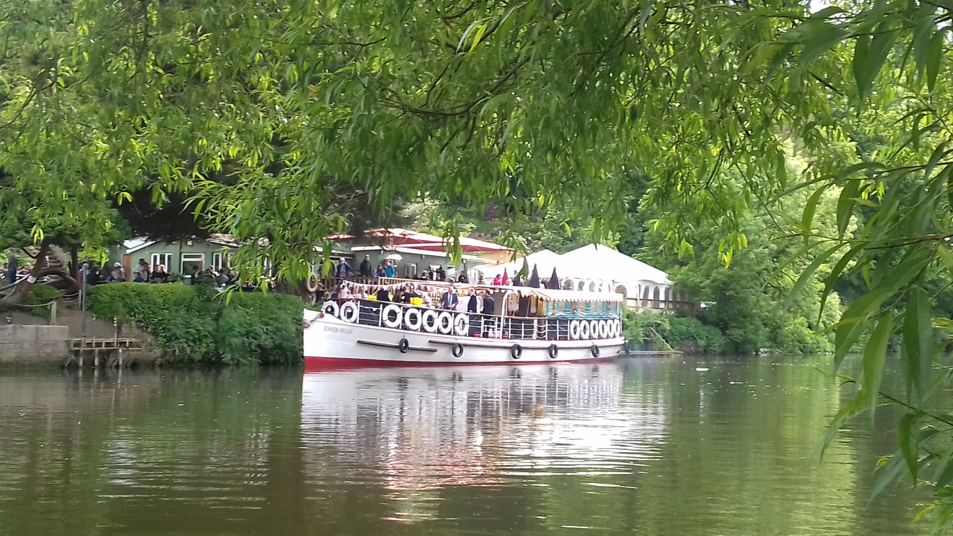 Charming outdoor event venue on a boat at Beeses Riverside Bar, perfect for celebrations.