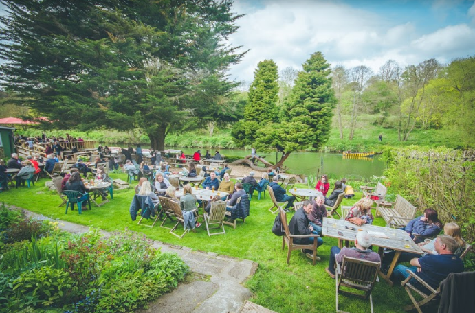 Vibrant outdoor venue at Beeses Riverside Bar for networking and casual gatherings.