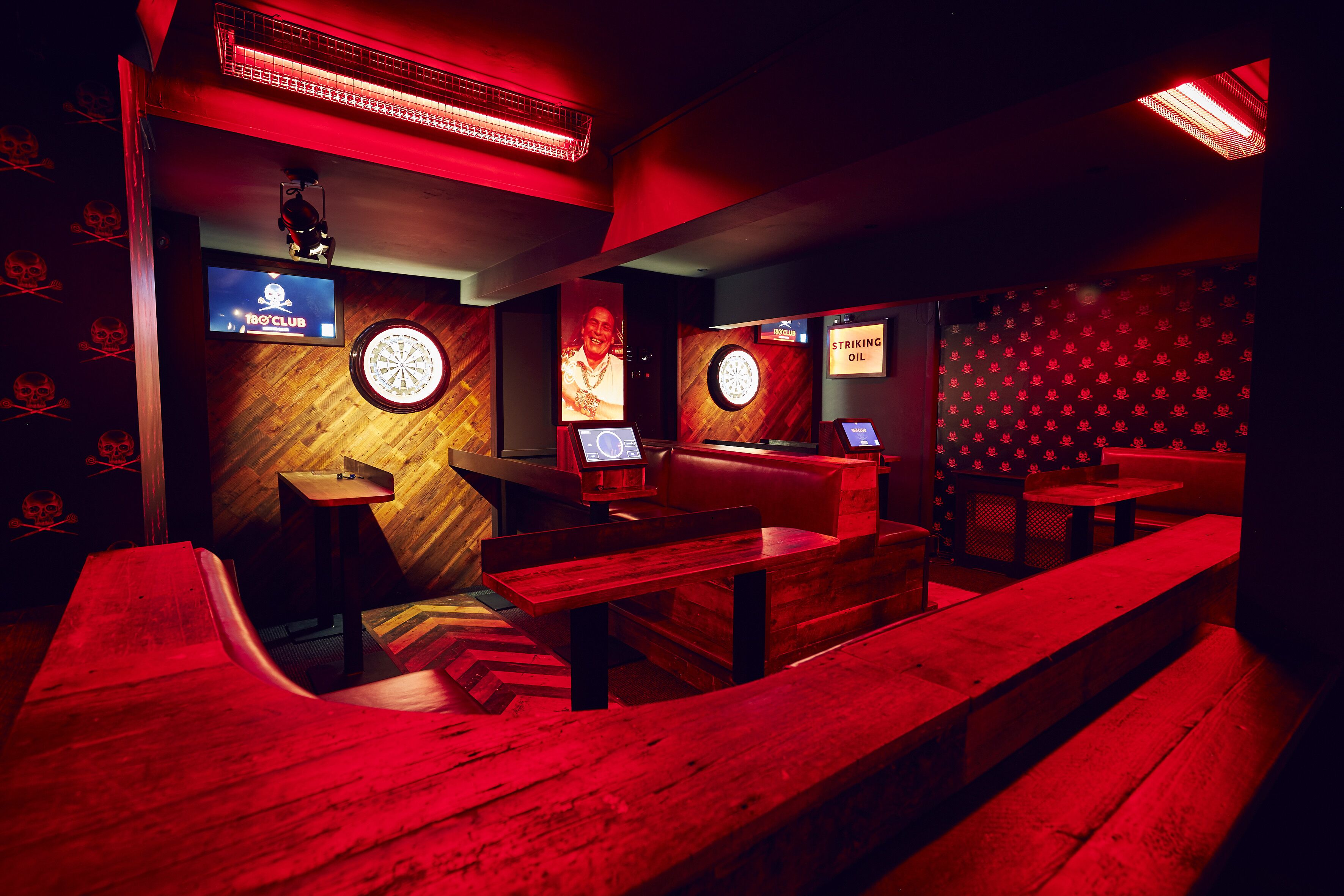 Vibrant darts space at 180 Club, ideal for team-building and social events.