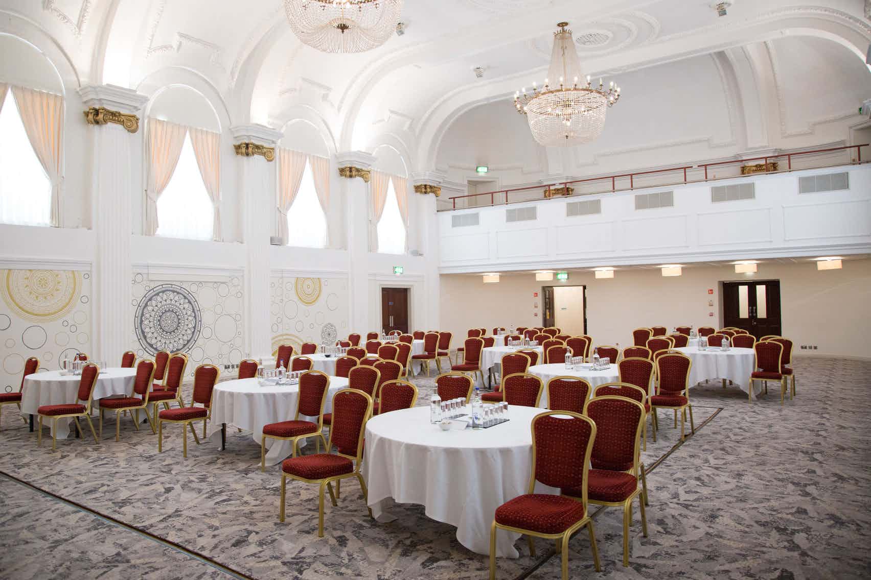 Elegant ballroom with chandeliers, perfect for weddings and conferences at Mercure Grand Bristol.