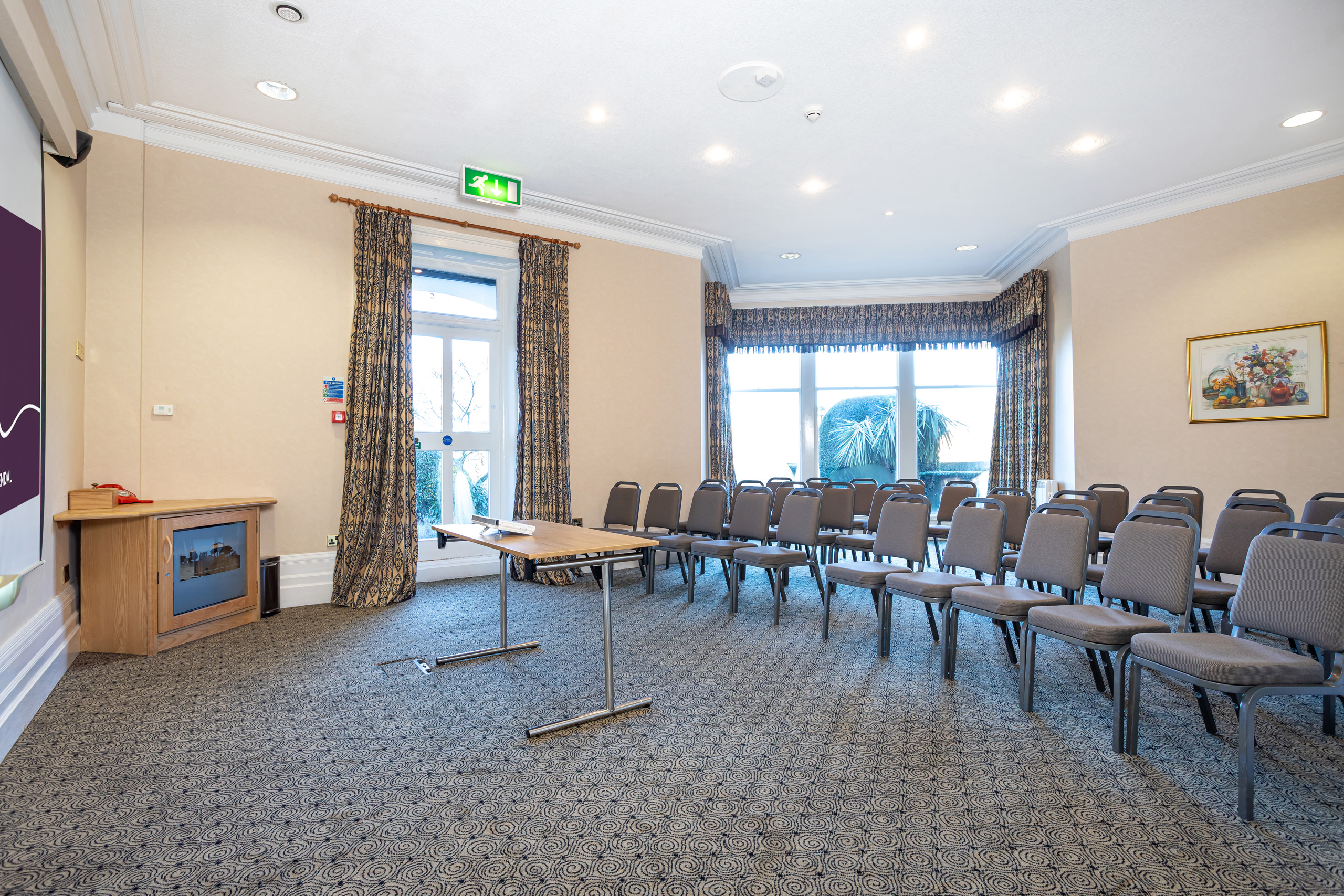 Garden Room at Castle Green Hotel, bright meeting space for workshops and conferences.