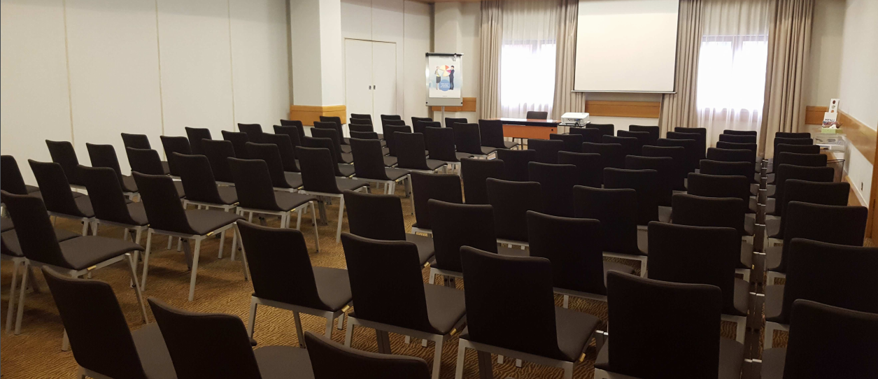 Victoria Suite meeting room at Novotel Bristol, bright setup for presentations and workshops.