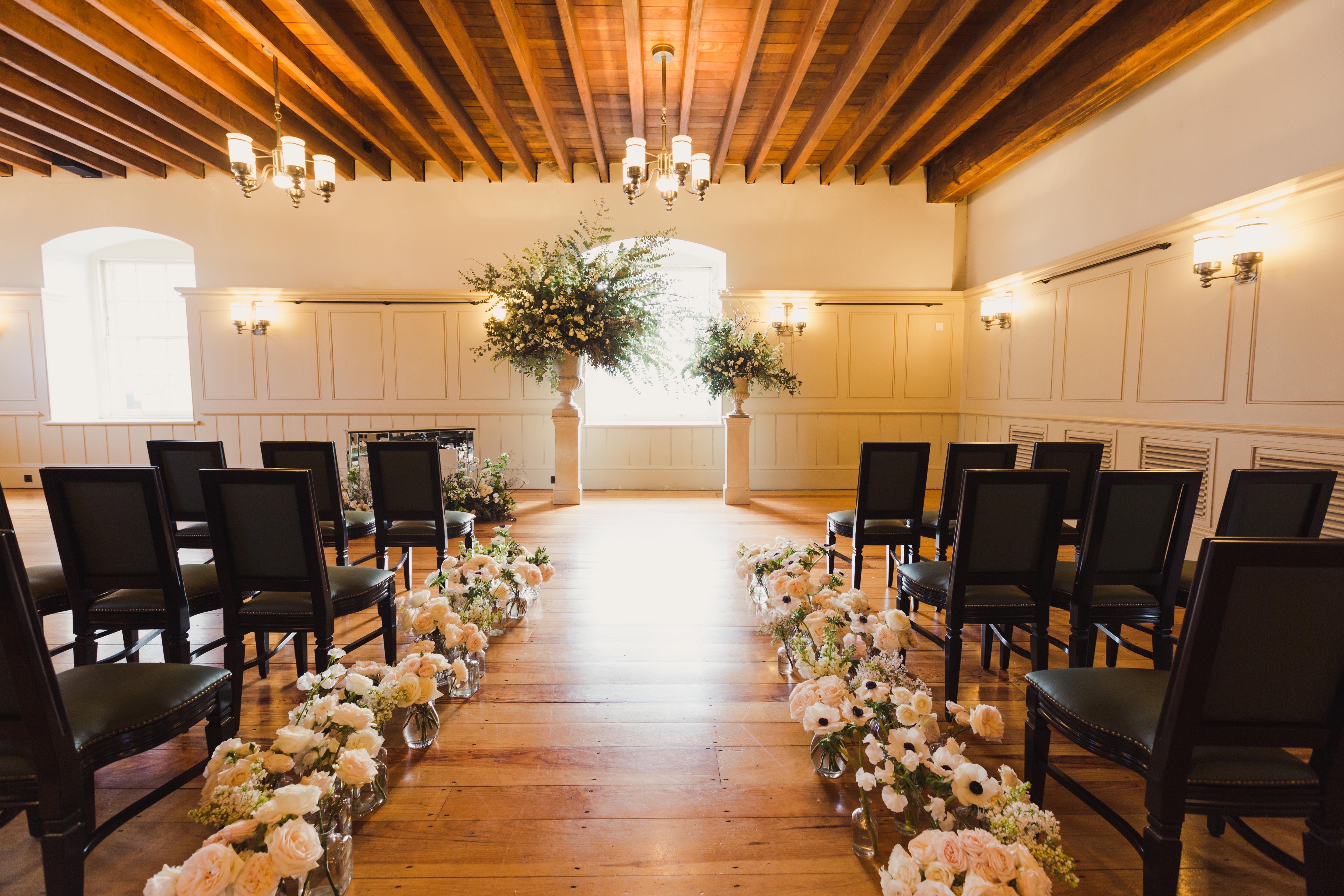 New Armouries event space at Tower of London, featuring elegant wooden beams for weddings.