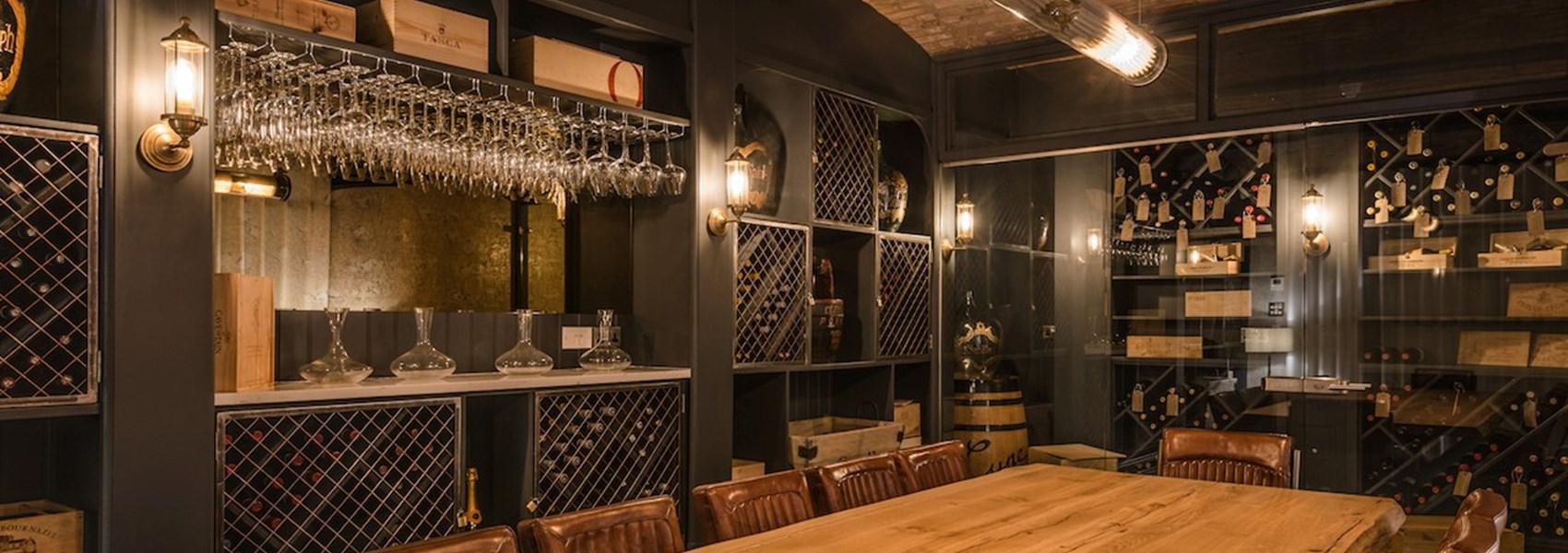 Sophisticated meeting space with wooden table and leather chairs at King Street Townhouse.