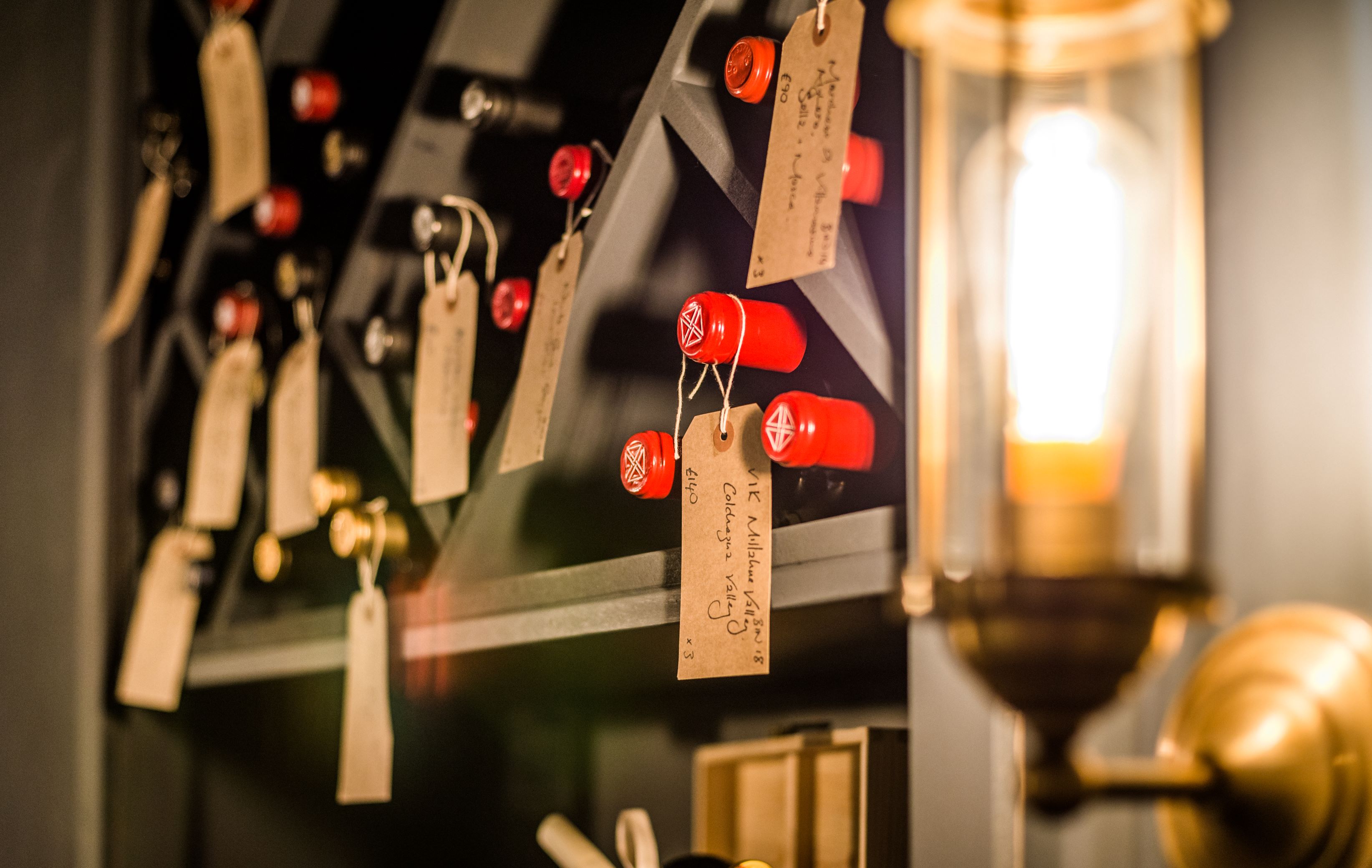 Wine cellar at King Street Townhouse, neatly arranged bottles for exclusive tastings.