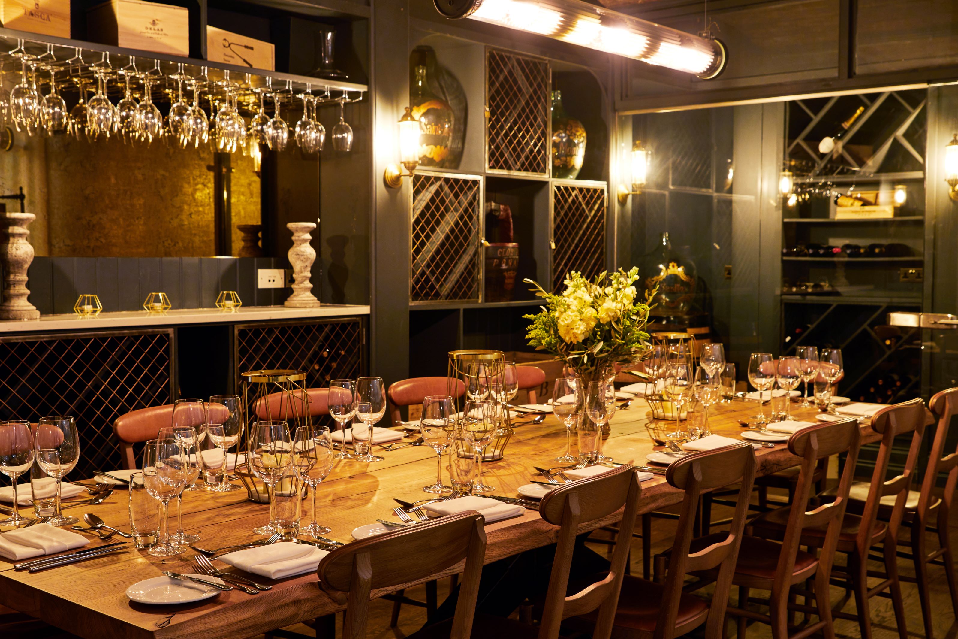 Elegant dining table in The Wine Cellar, perfect for corporate dinners and intimate gatherings.