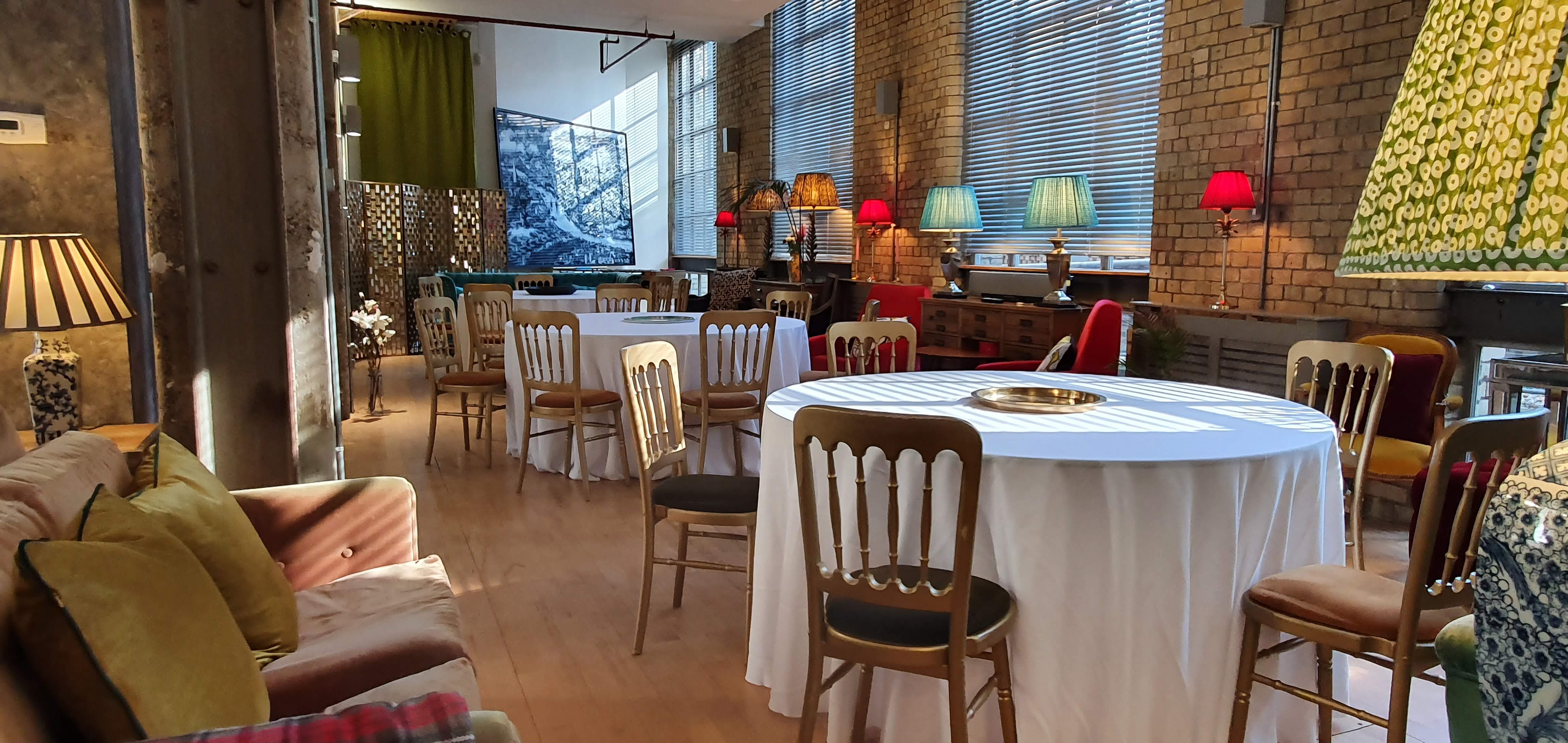 Versatile event space with round tables at The New Yorker Gallery, Lumiere London Southbank.