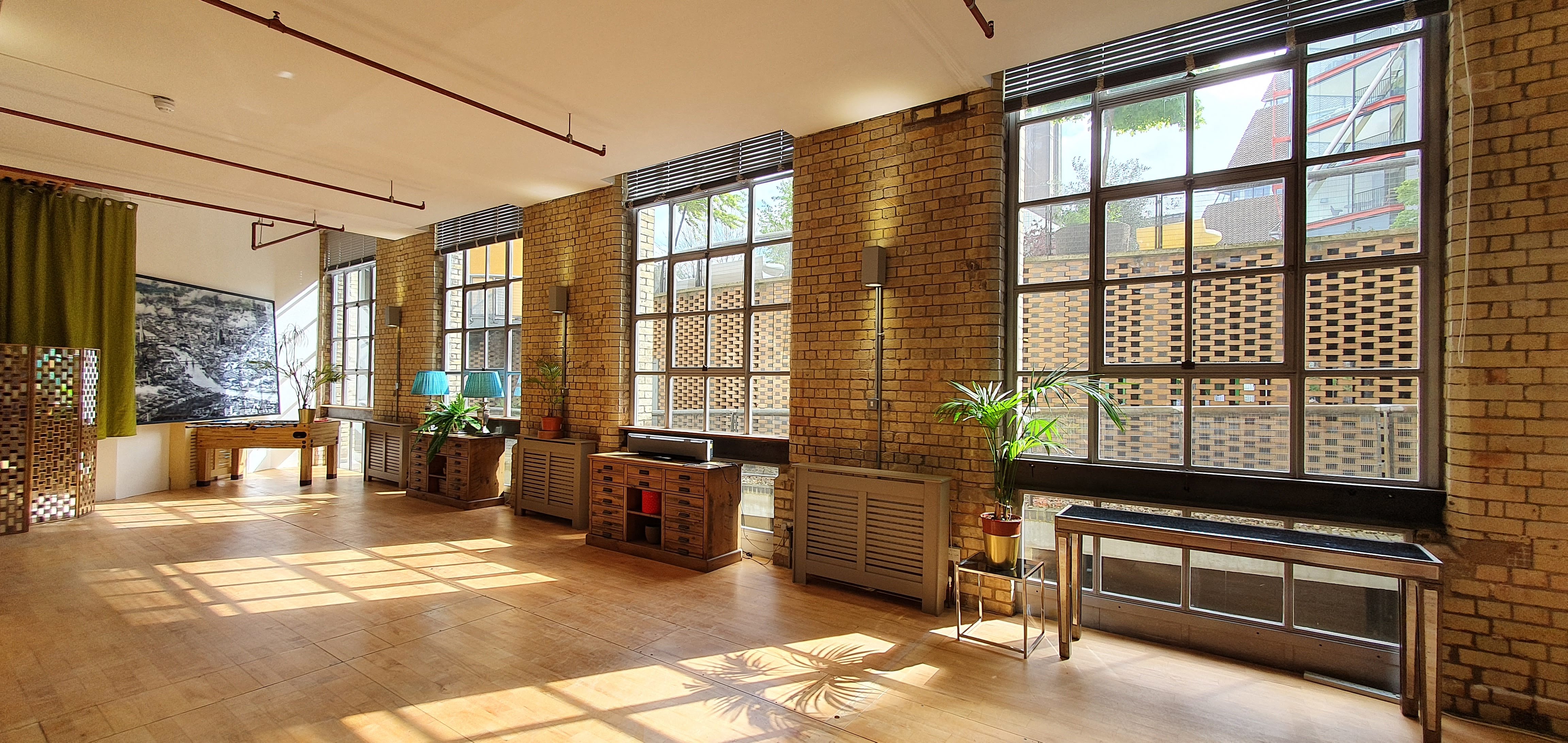 Bright event space at The New Yorker Gallery, ideal for workshops and networking.