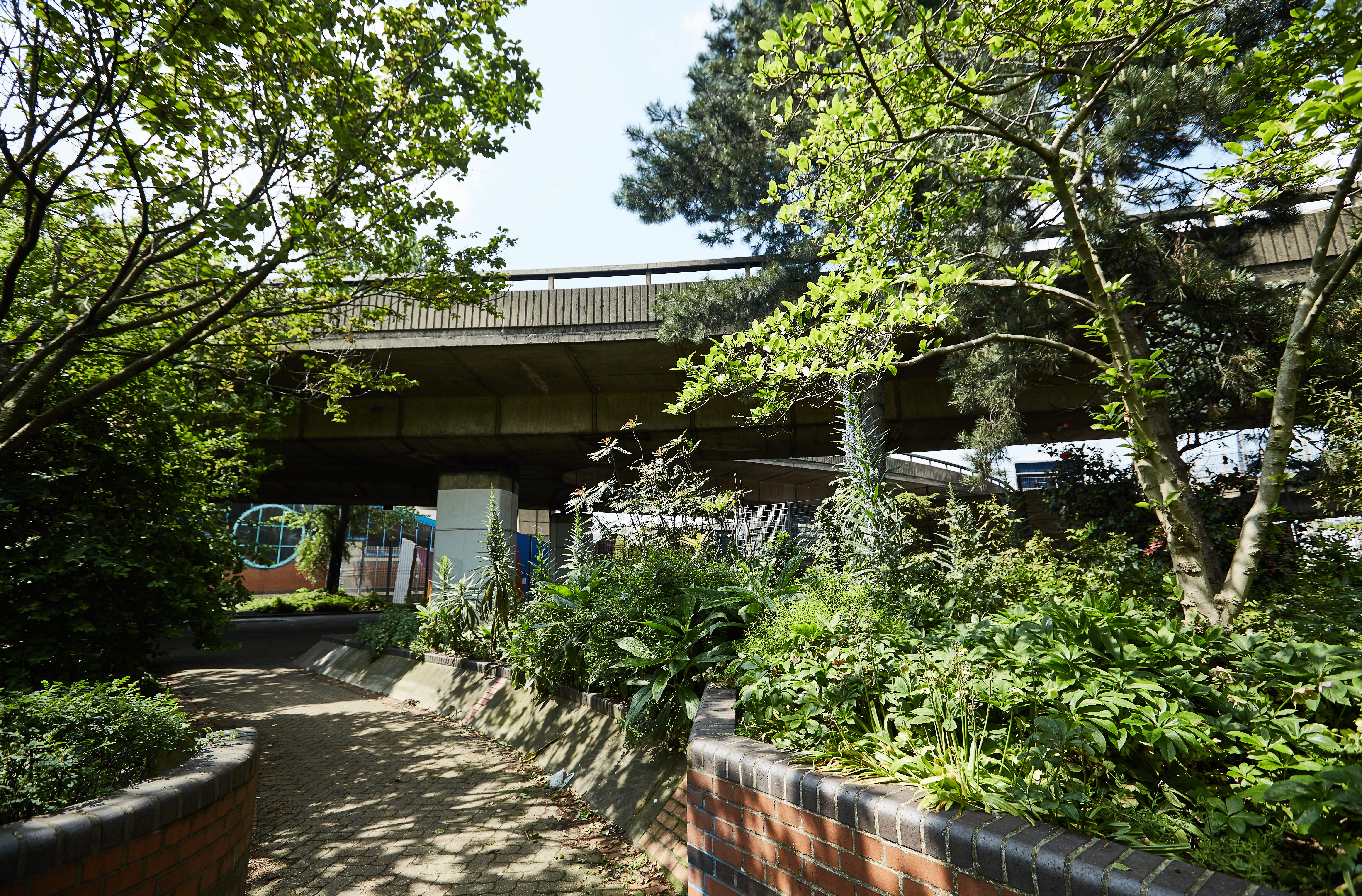 Urban venue with greenery at Westway Sports & Fitness Centre for creative events.