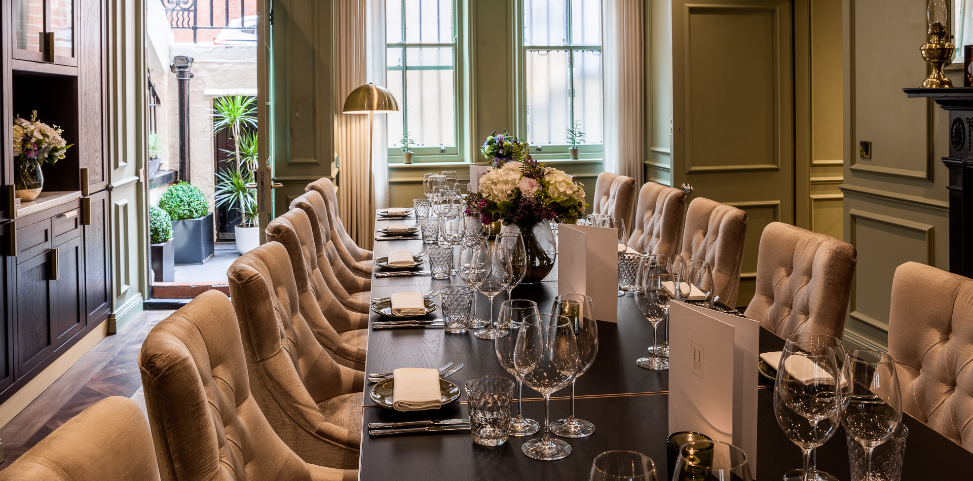 Sophisticated meeting room at The Curio Lounge, perfect for upscale events and dinners.