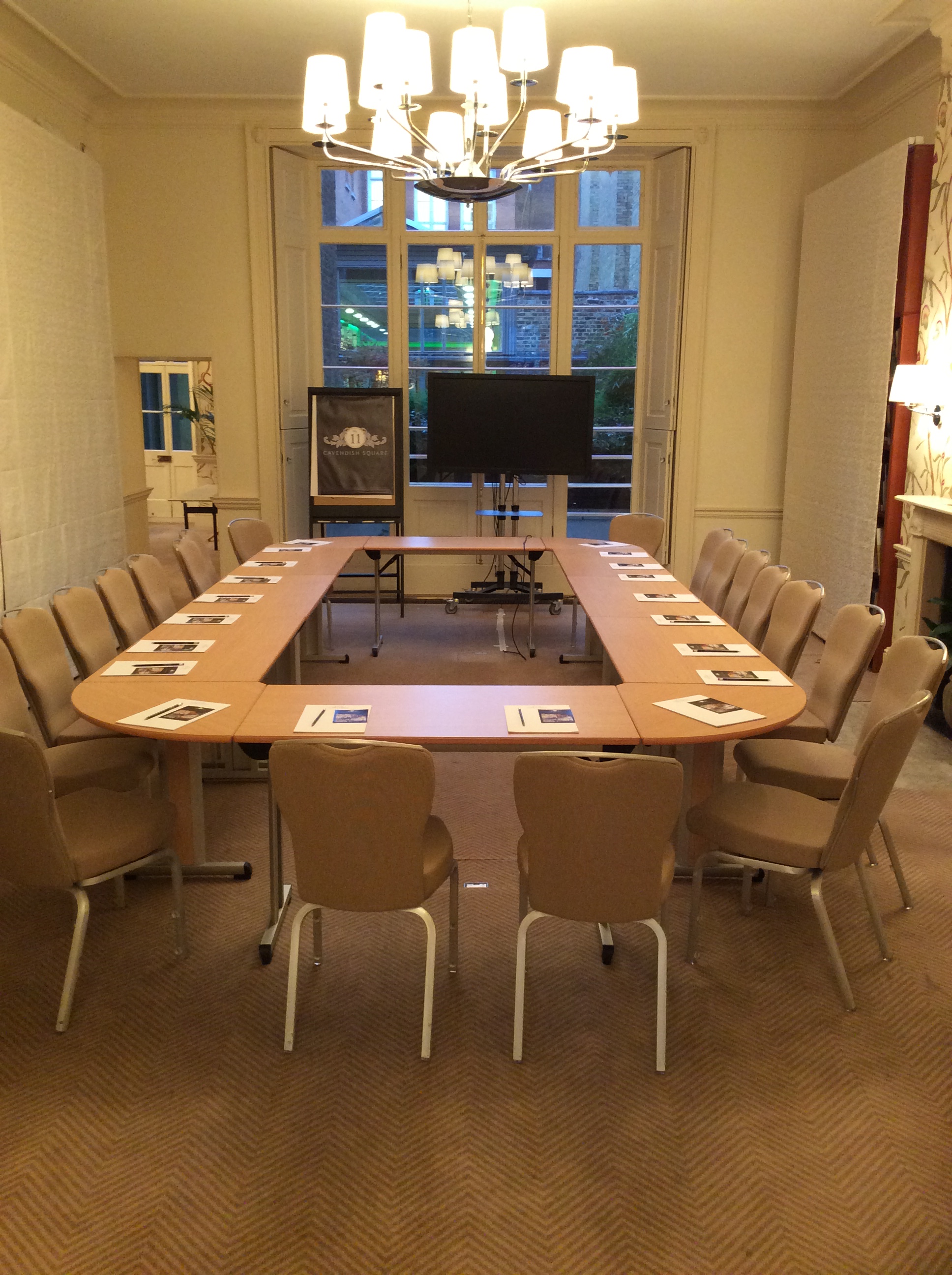 Garden Room at No.11 Cavendish Square, U-shaped table setup for professional meetings.