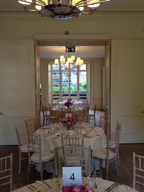 Elegant dining room with floral centerpieces for sophisticated events at No.11 Cavendish Square.