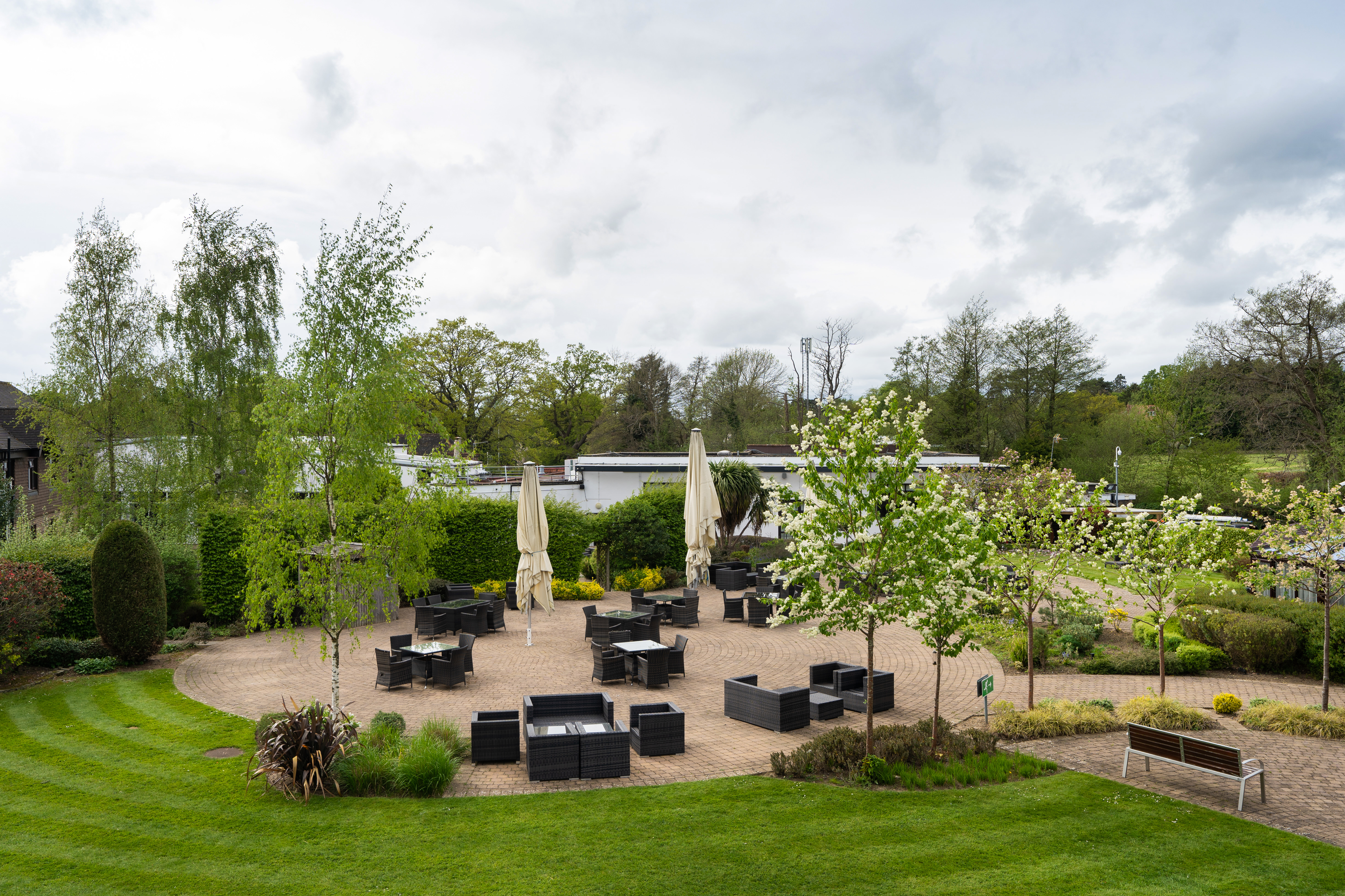 Grand Ballroom at Crowne Plaza Felbridge, modern seating for outdoor networking events.