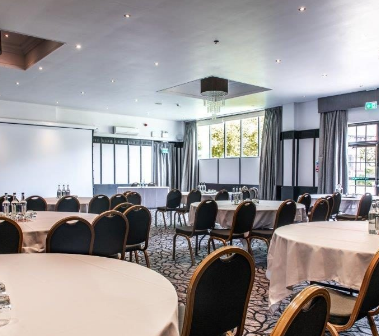 Grand Ballroom at Crowne Plaza Felbridge, elegant setup for conferences and workshops.