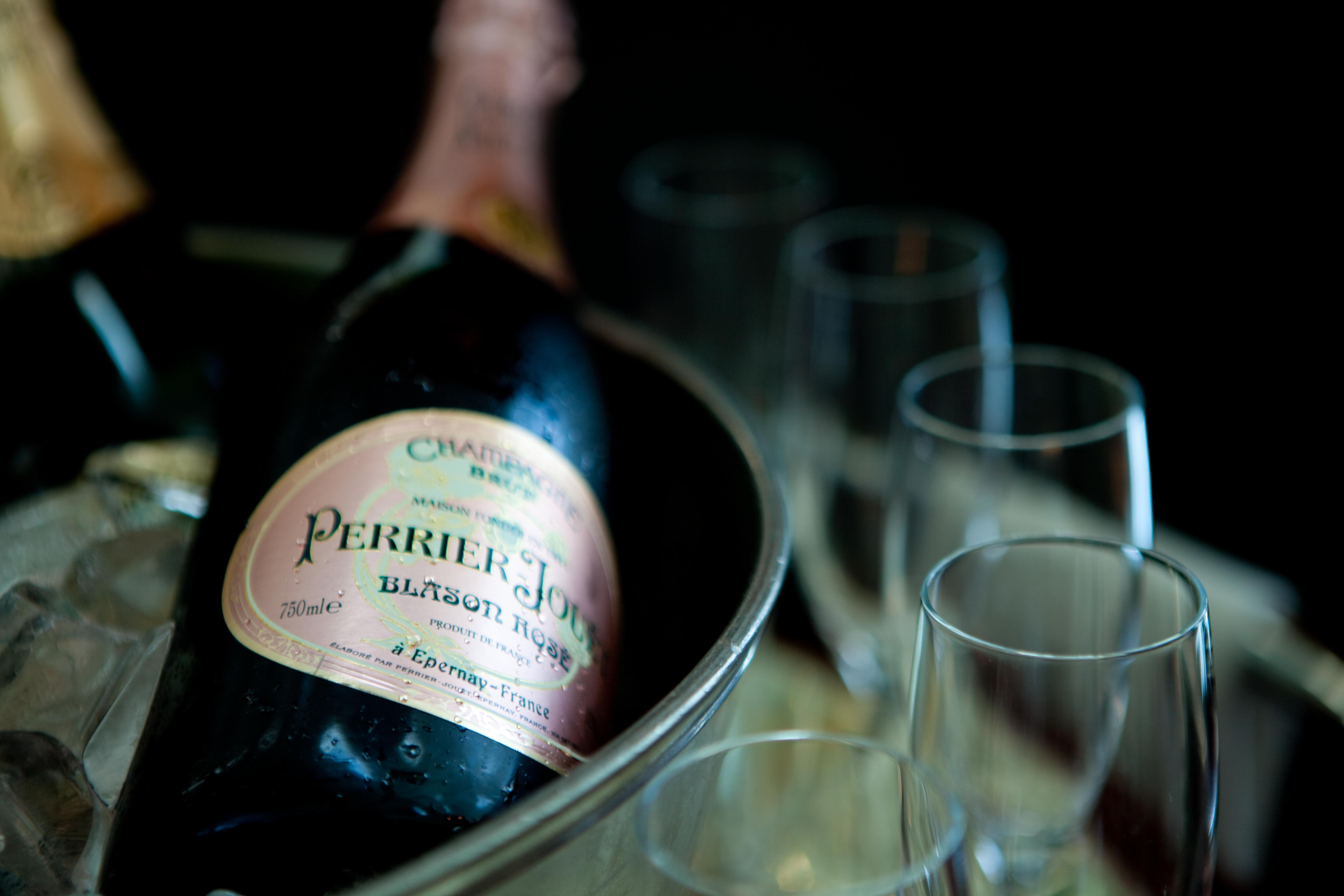 Champagne in ice bucket at Sofitel London Heathrow for luxury events and celebrations.