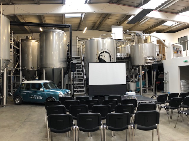 Main Brew Room at Small Beer Brewery with stainless steel tanks, ideal for events and meetings.