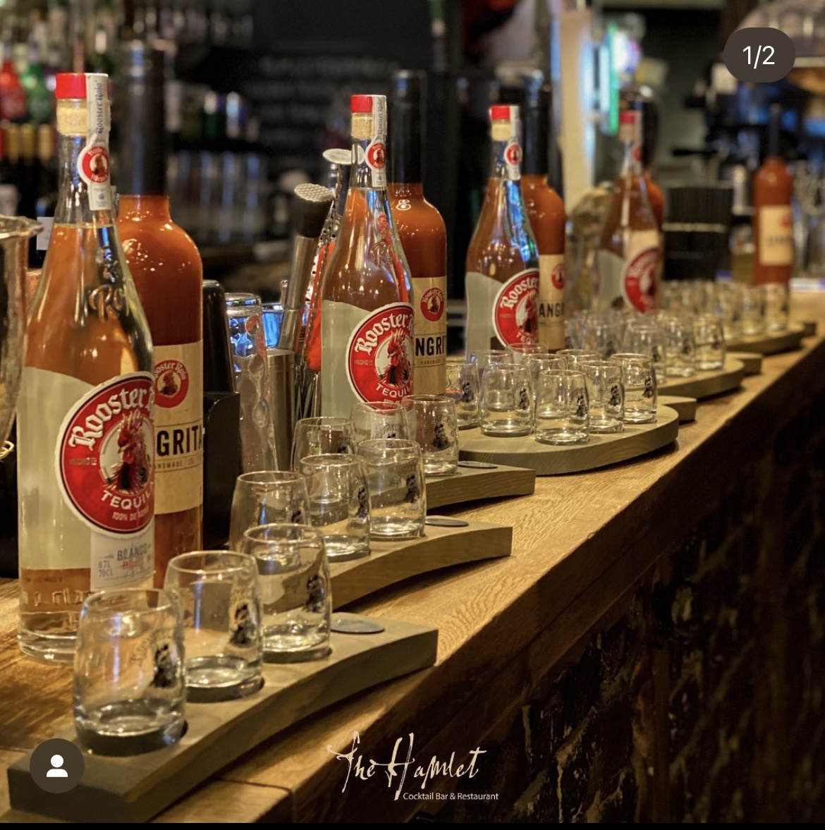 The Hamlet Vinyl Bar with spirits and shot glasses, ideal for networking events.