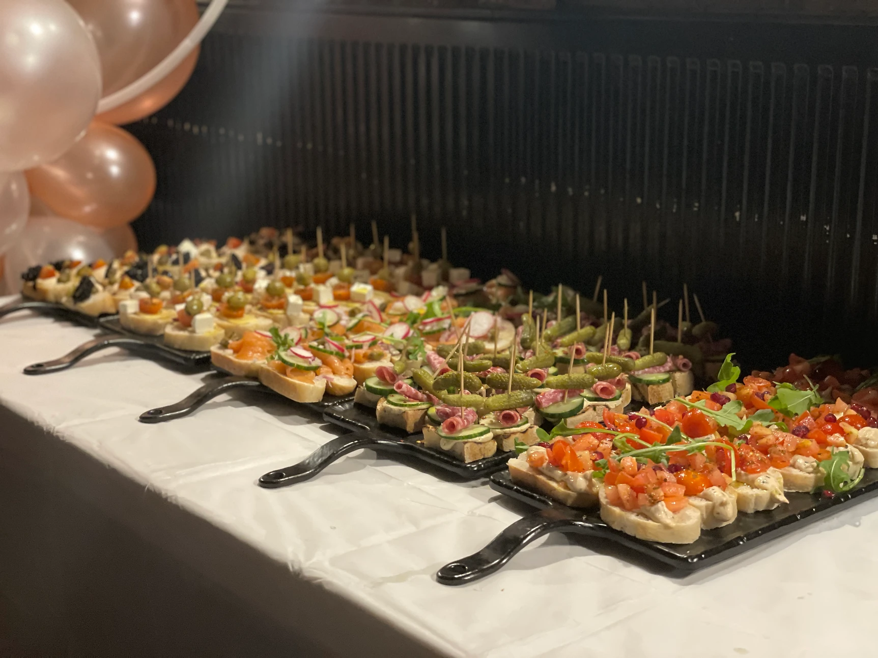 Elegant hors d'oeuvres display at The Hamlet Vinyl Bar for networking events and celebrations.