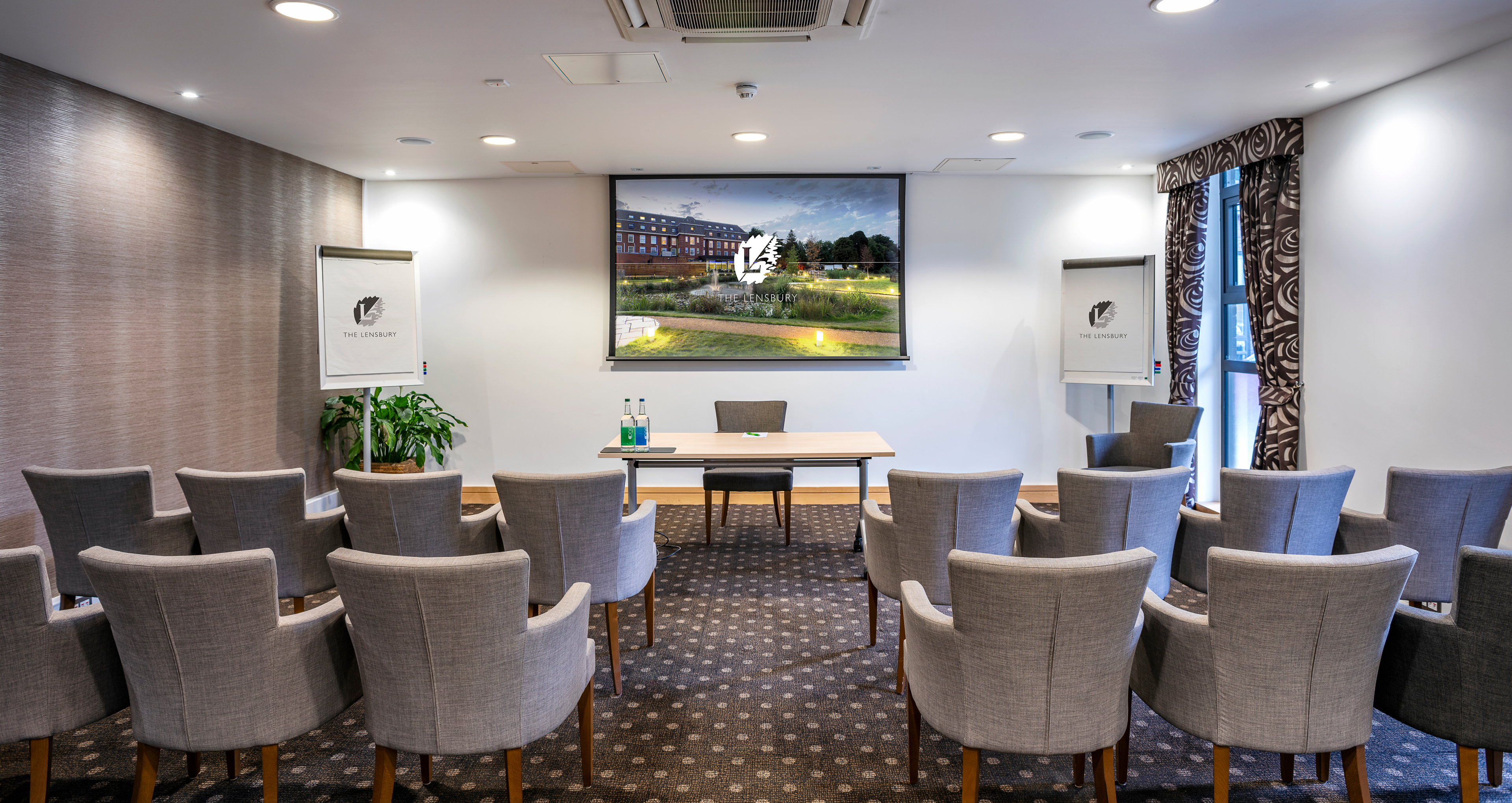 Lloyd Room at The Lensbury: bright meeting space for workshops and conferences.