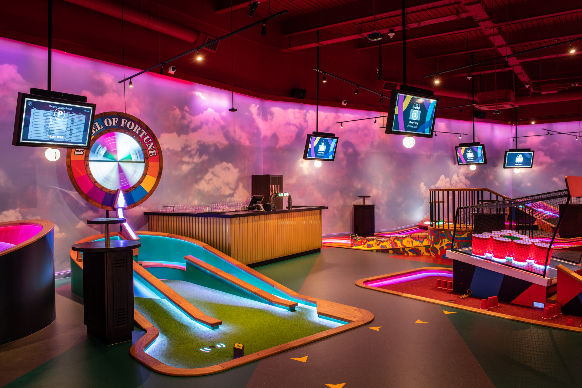 Ruby semi-private event space at Puttshack Lakeside with mini-golf for team-building fun.