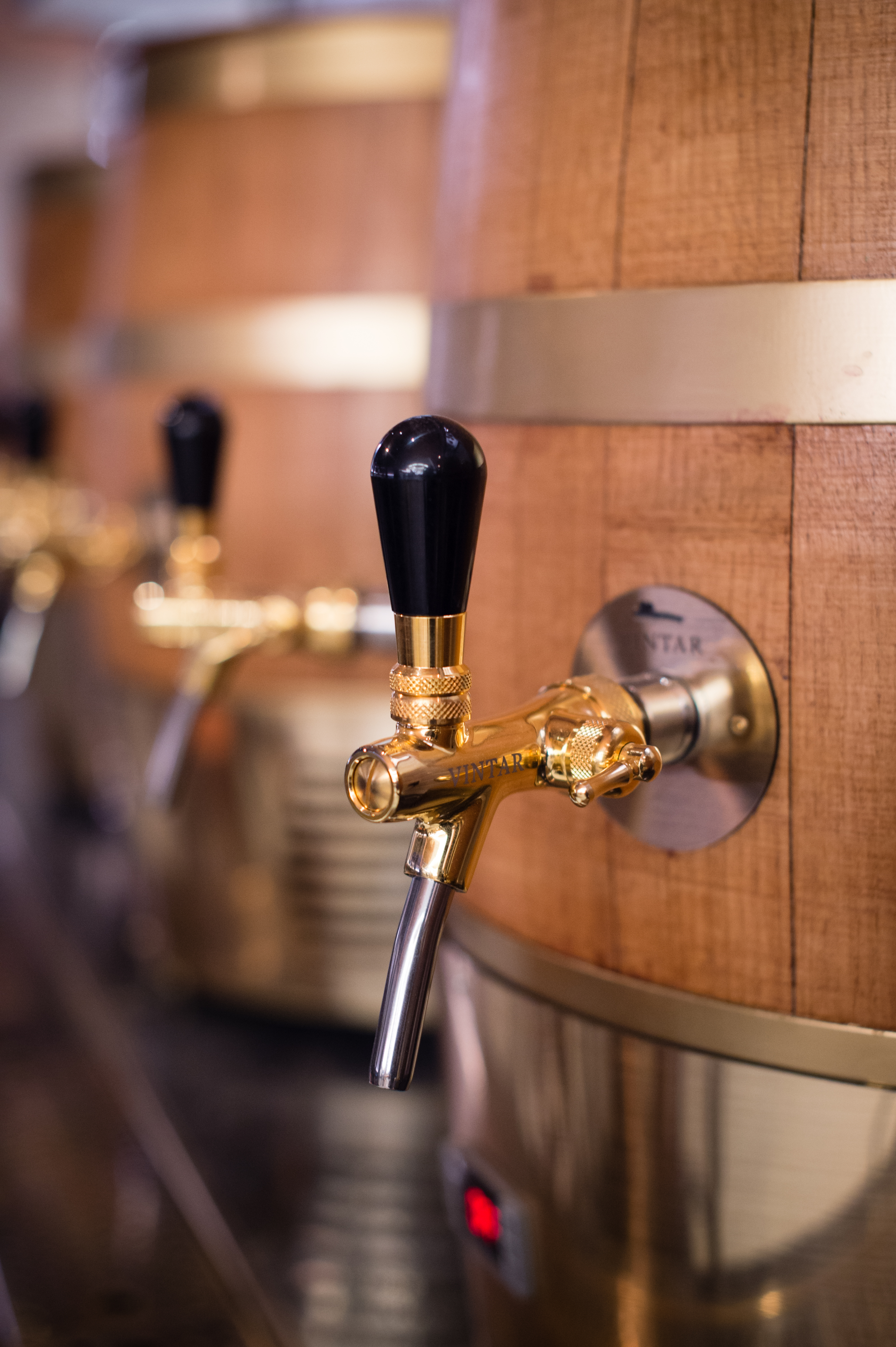 Polished beverage tap at Vintry Kitchen, perfect for upscale event catering.