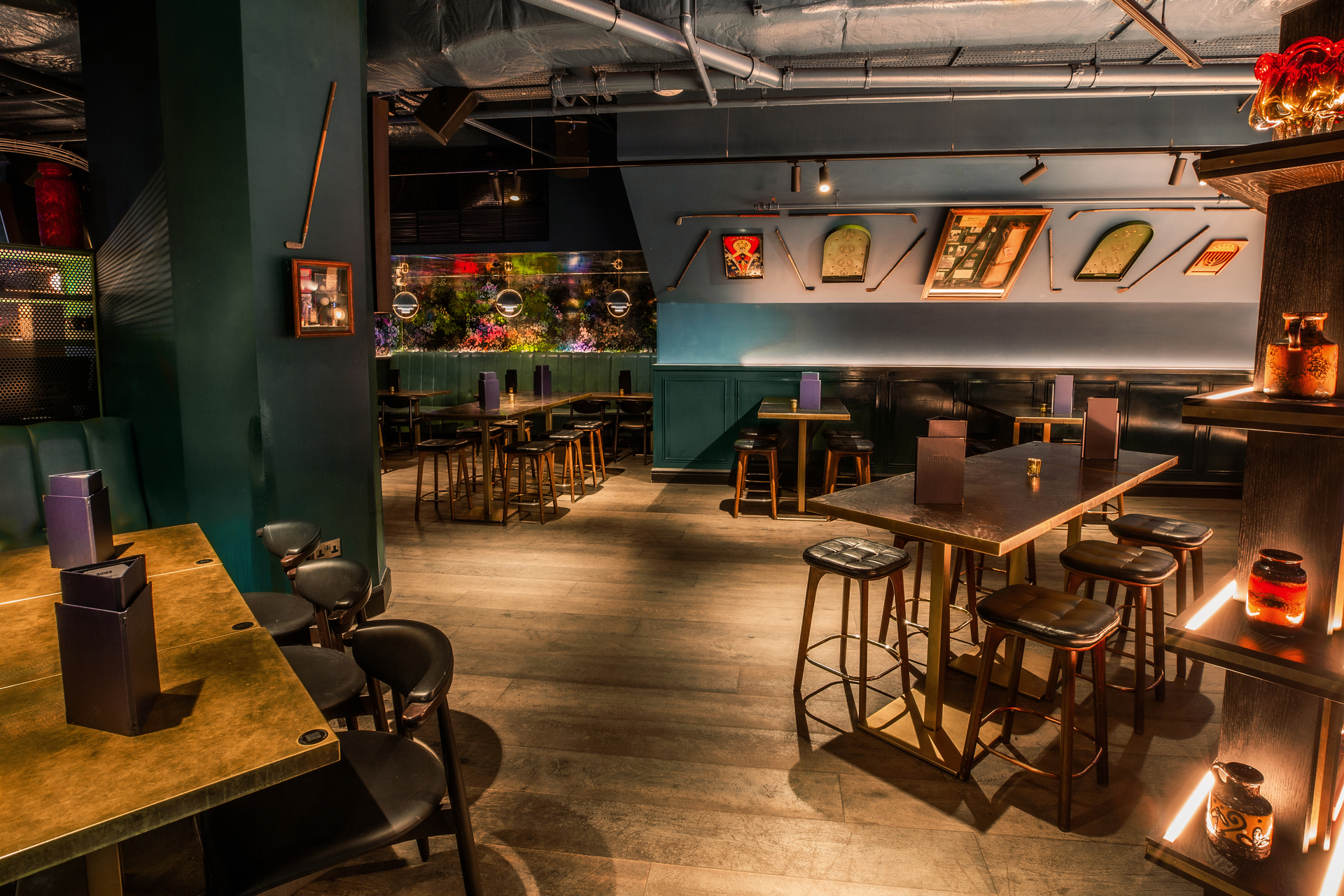 Christmas party at Puttshack Bank with stylish decor and inviting atmosphere.