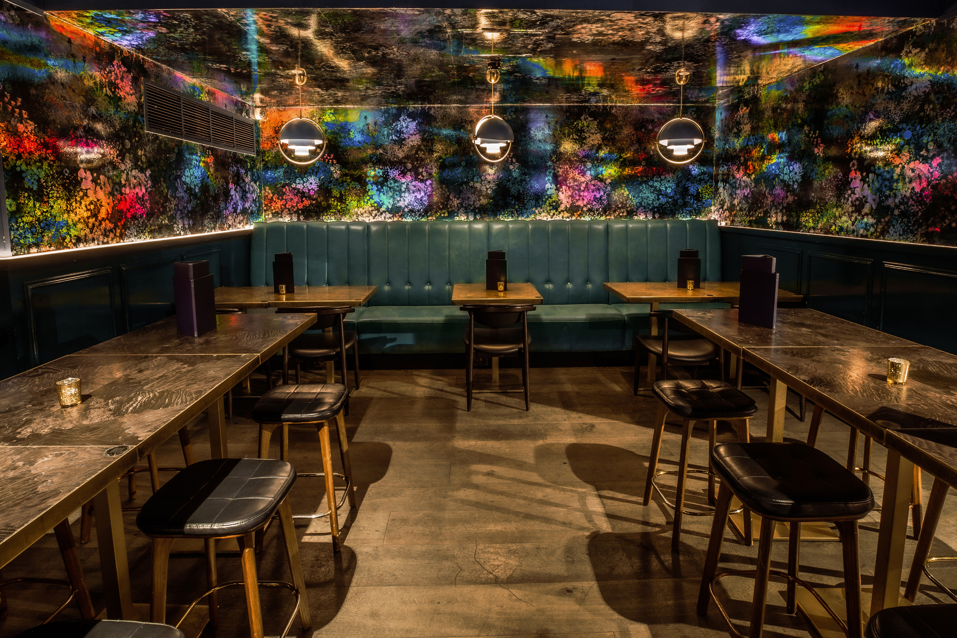 Christmas party at Puttshack Bank with colorful decor, ideal for networking events.