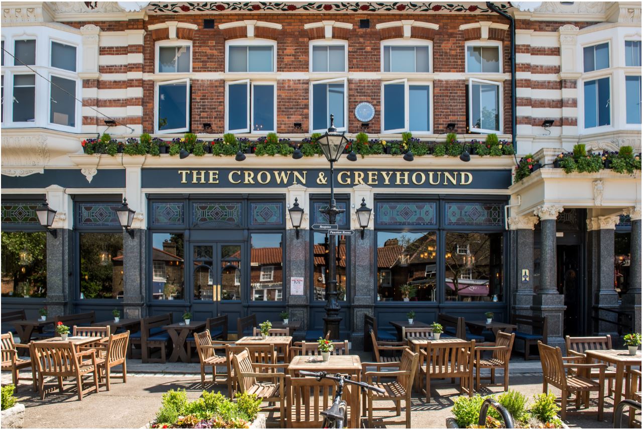 Dulwich Suite pub exterior with outdoor seating for casual gatherings and networking events.
