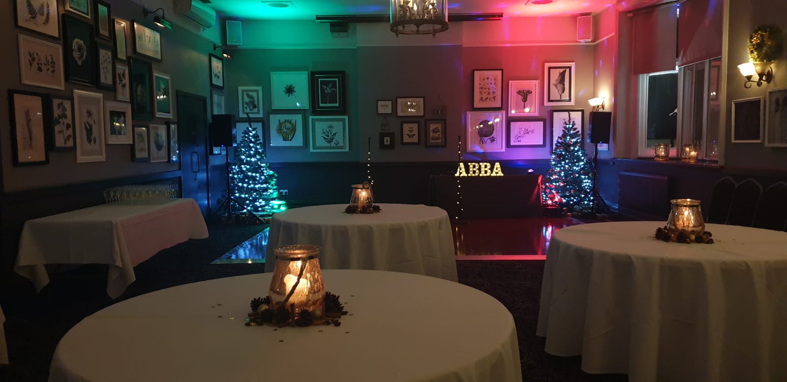 The Dulwich Suite at The Crown and Greyhound, festive event space with vibrant decor.