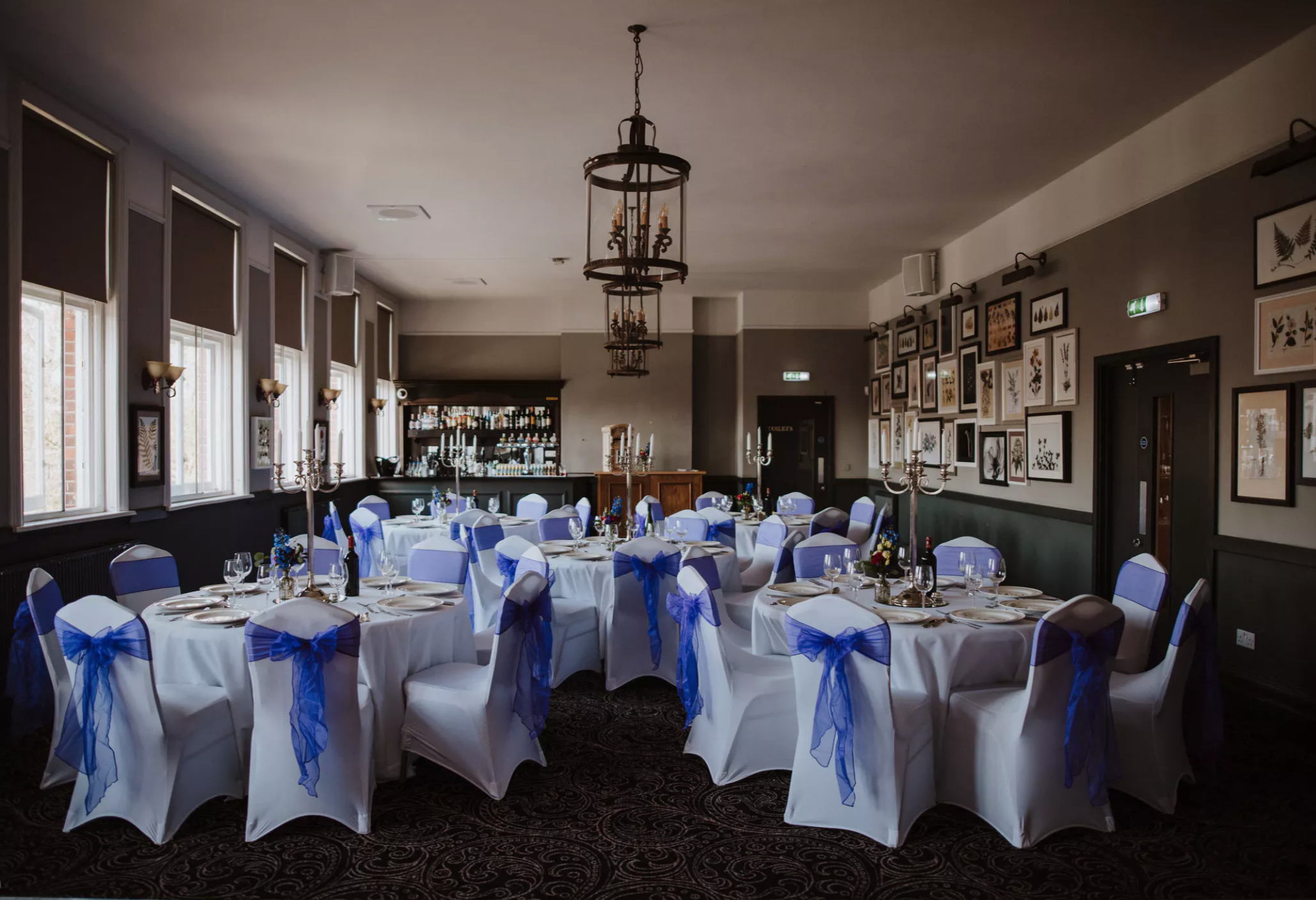 Elegant Dulwich Suite with round tables, ideal for weddings and formal events.