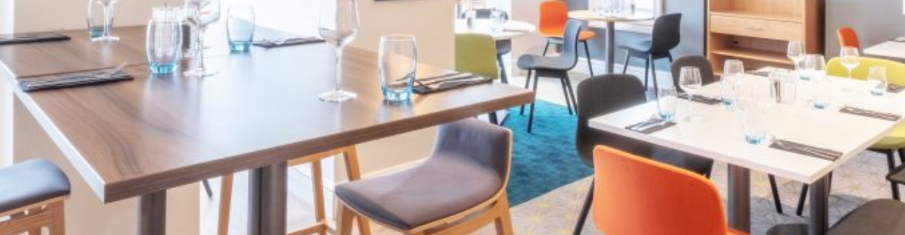 Hampshire Suite at Holiday Inn Farnborough, modern dining setup for events and meetings.