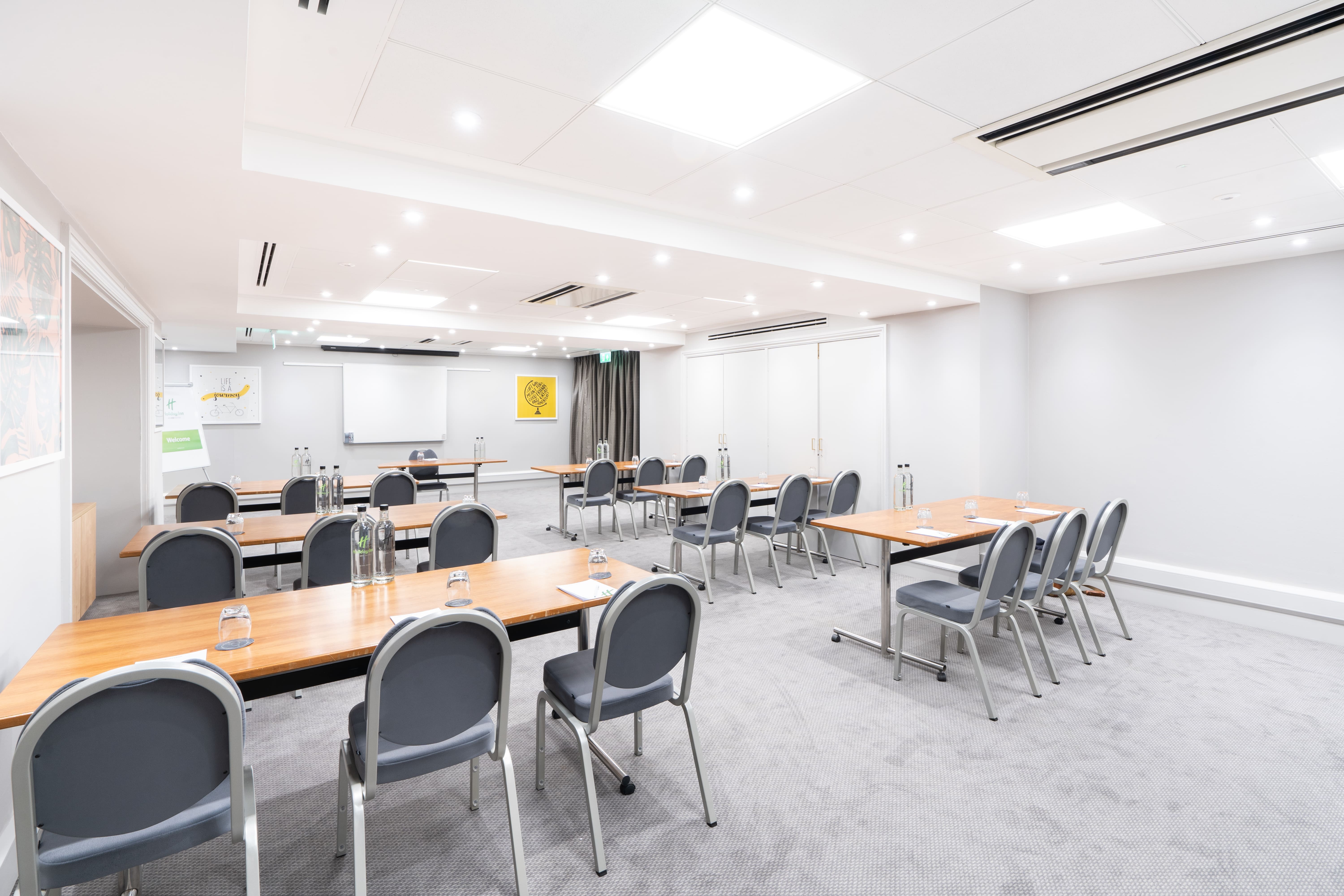 Langley Suite at Holiday Inn Hemel Hempstead, modern meeting room for corporate events.