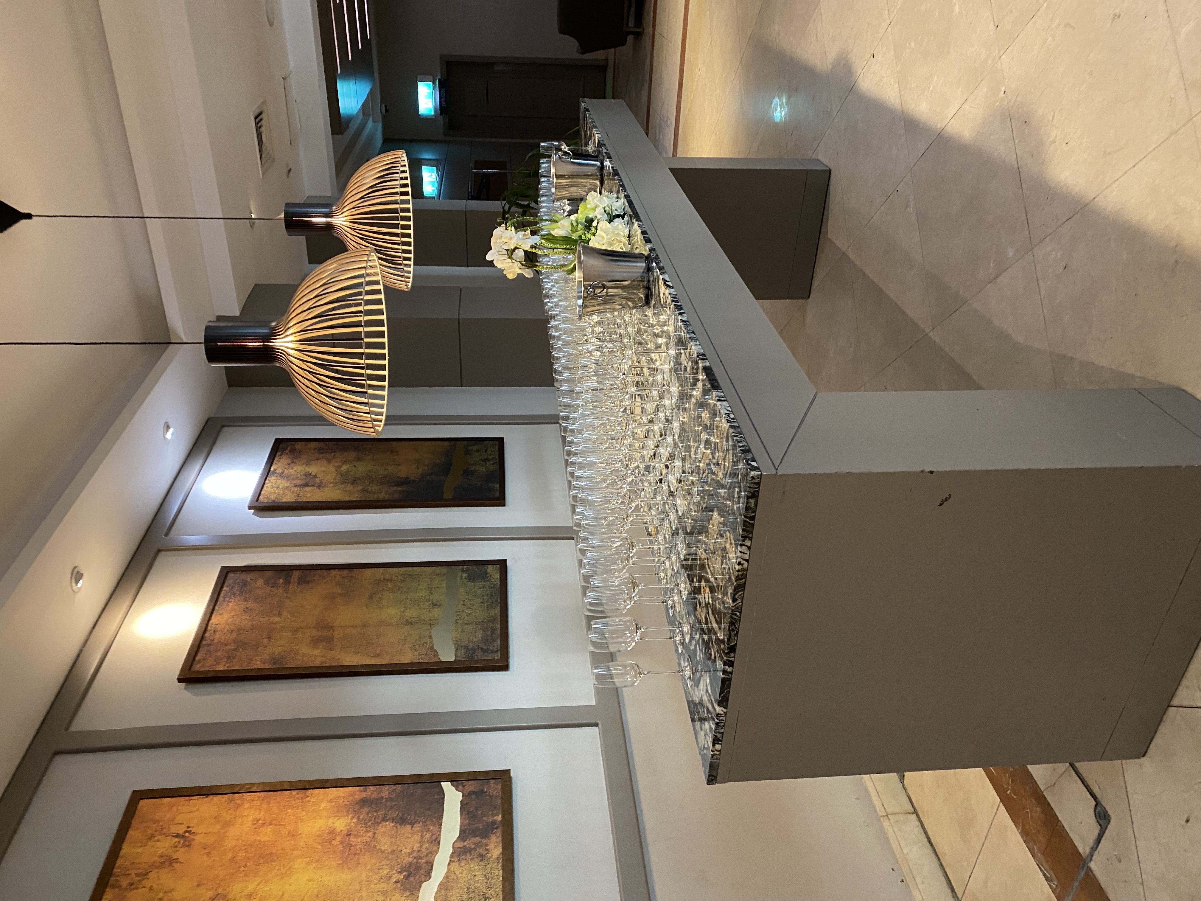 Ivy Suite at The Crown London Hotel, modern event space with elegant decor and glassware.