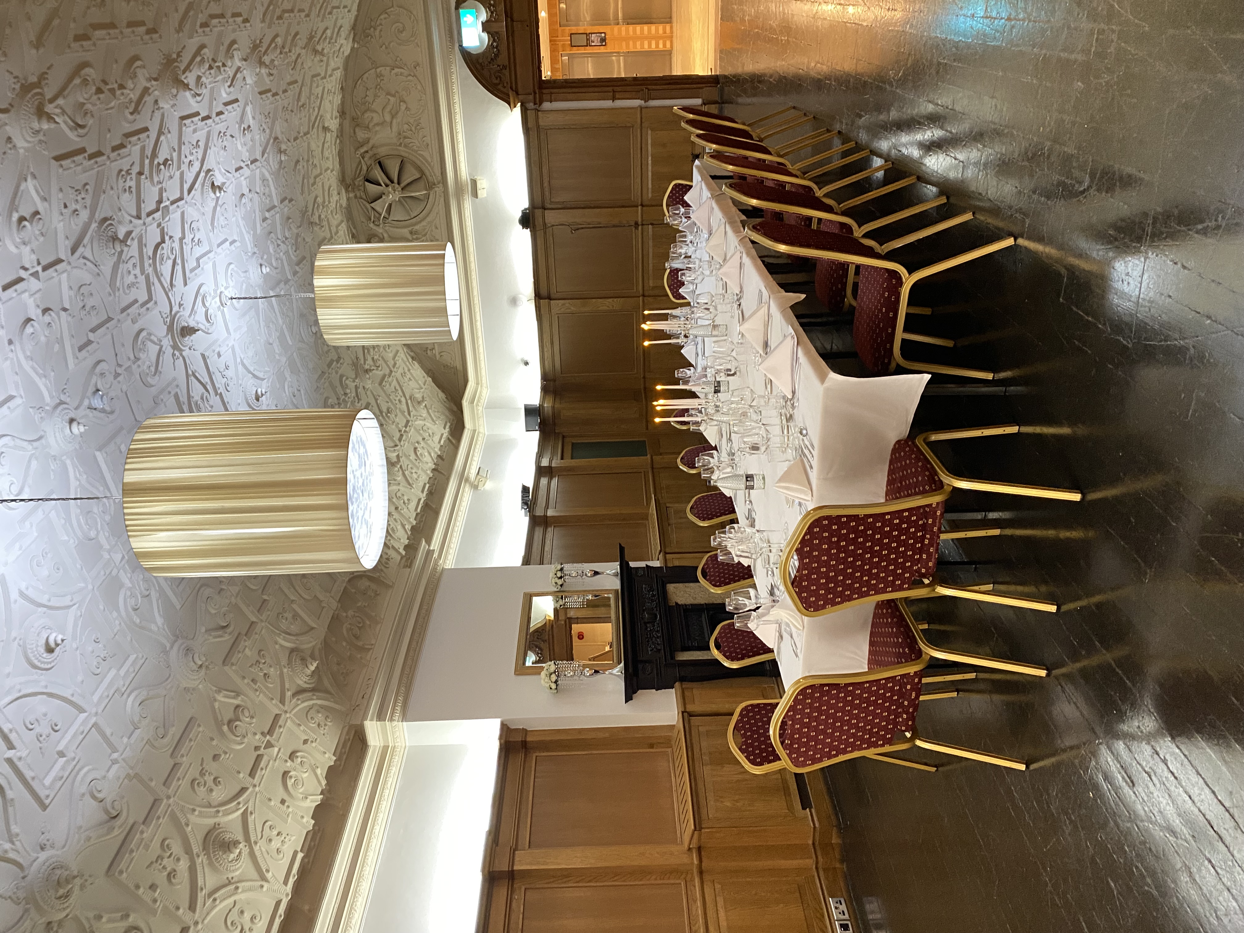 Sala Room at The Crown London Hotel, elegant dining space for meetings and events.