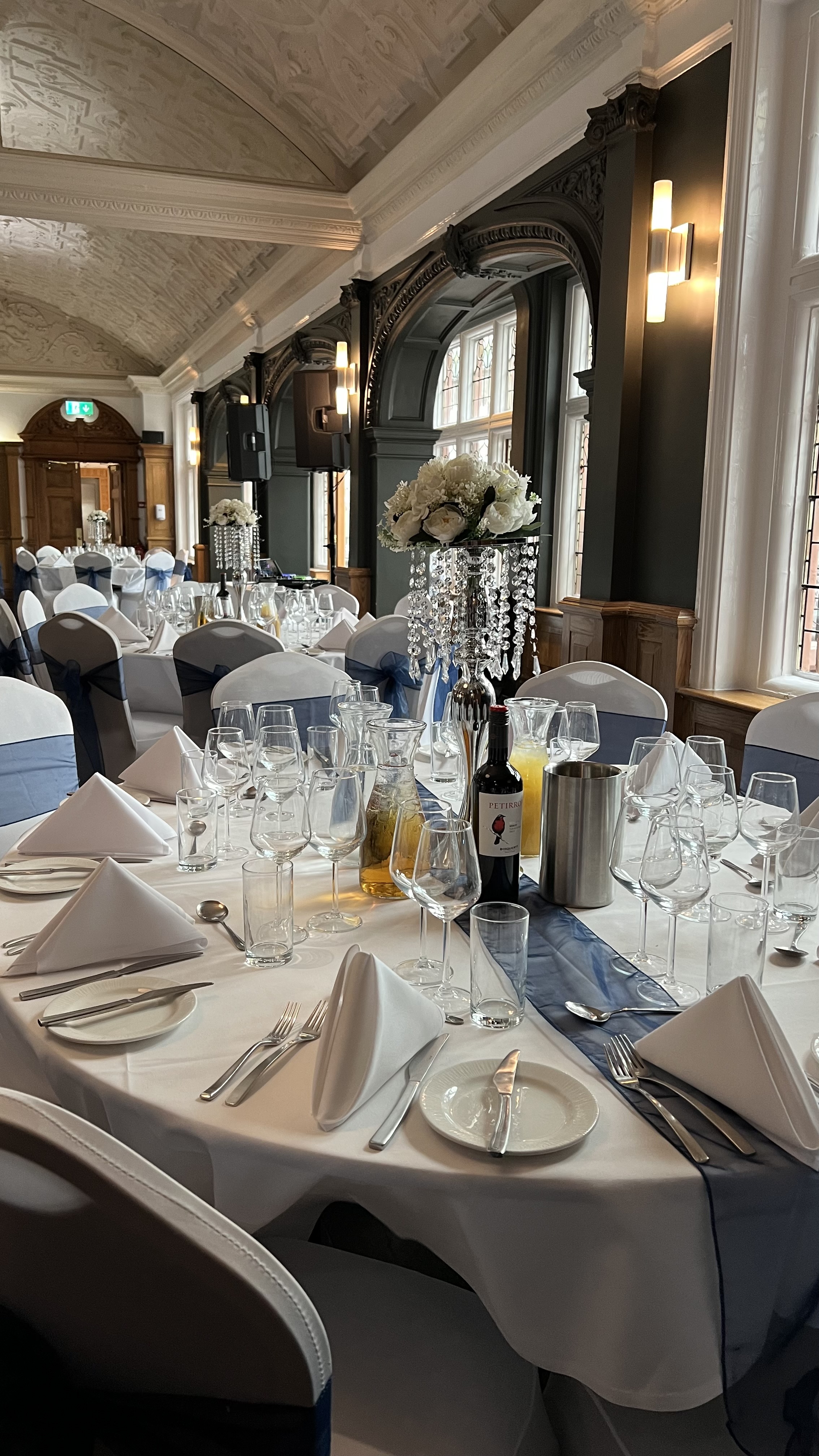 Elegant dining table in Sala Room, The Crown London Hotel, perfect for formal events.