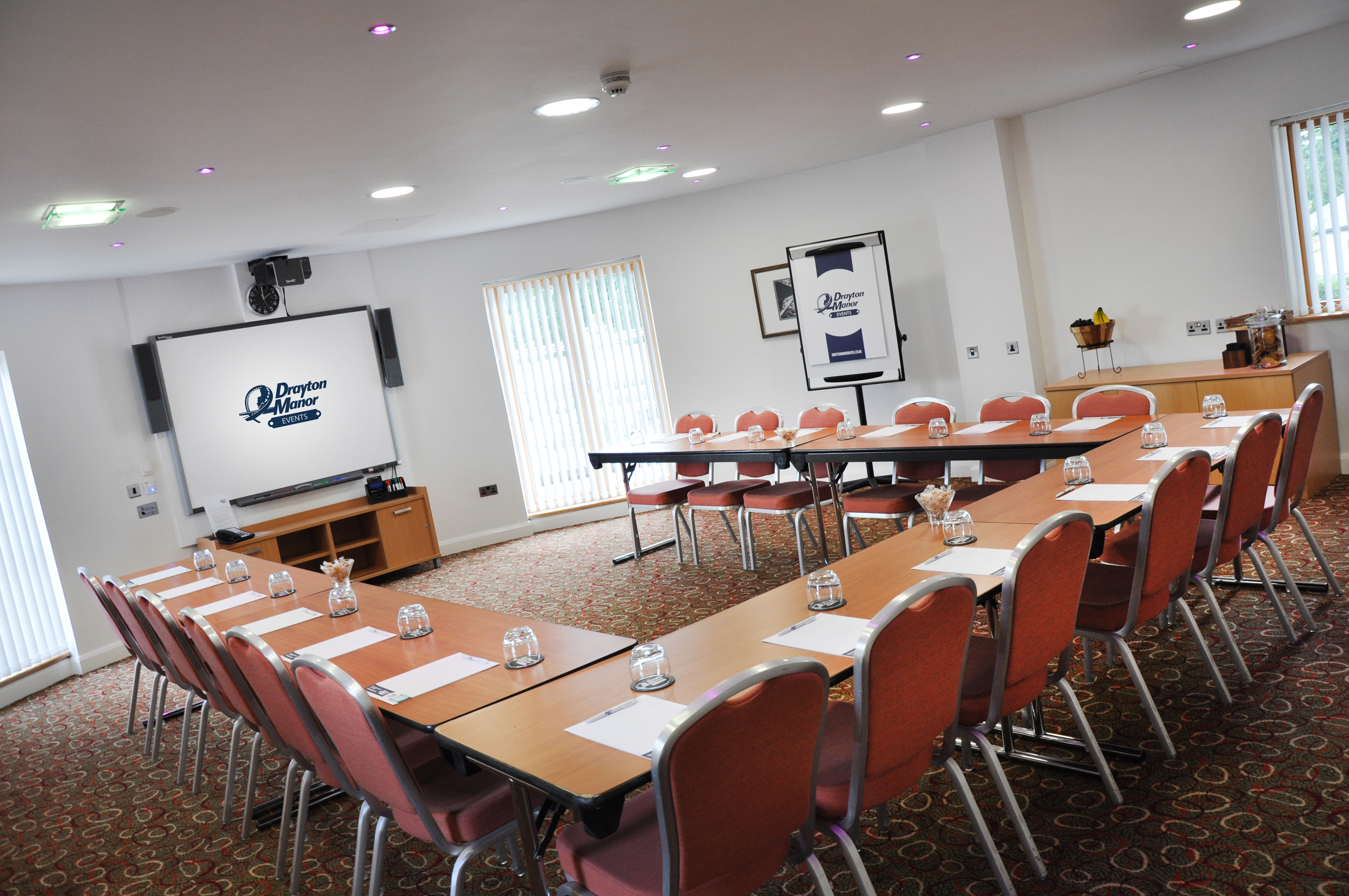 Peel Room at Drayton Manor Hotel, U-shaped tables for professional meetings and workshops.