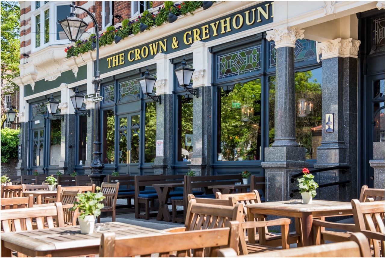 Billiards Room at The Crown and Greyhound: inviting venue with outdoor seating for summer events.