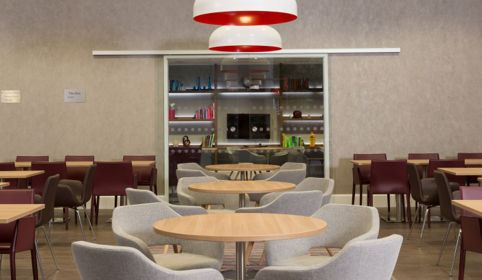 Modern dining area in Staybridge Suites Birmingham for meetings and events.