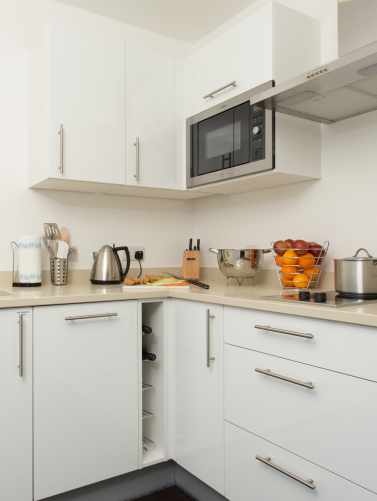 Modern kitchen in Staybridge Suites Birmingham, perfect for event catering and networking.