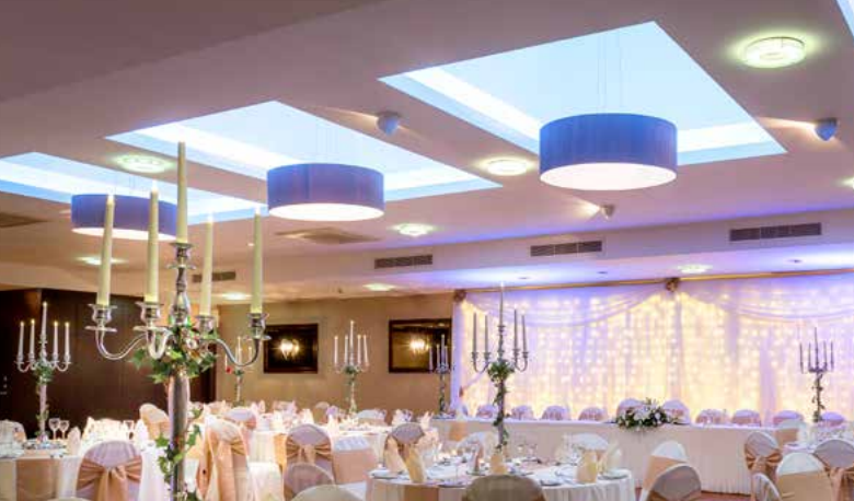 Tyrconnell Suite at Maldron Hotel Derry, elegant wedding venue with stylish chandeliers.